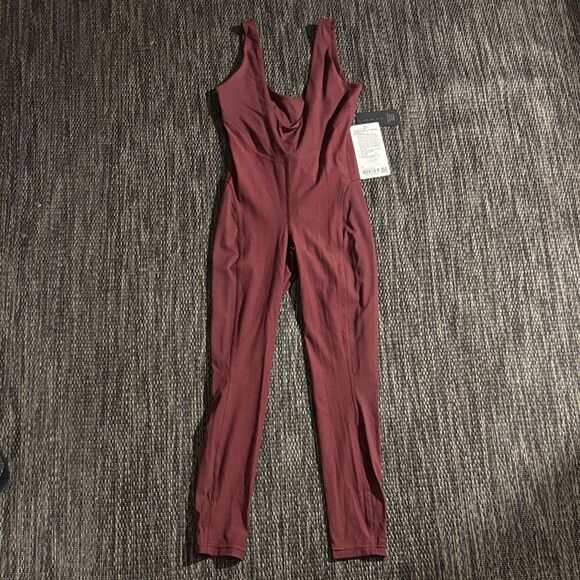 lululemon athletica Pants - Lululemon Ribbed Nulux Skiing Bodysuit
Asia Fit